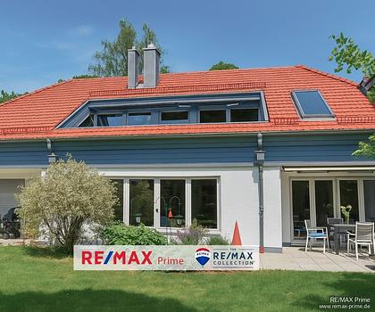 Grünwald: Stilvolle Architektur in Toplage – Villenhälfte in Waldrandlage