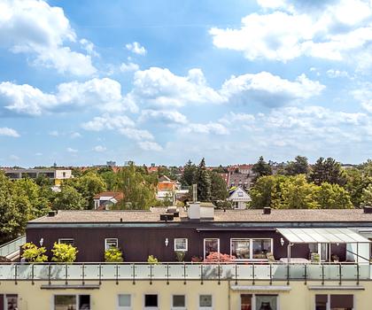 Gepflegte, flexibel gestaltbare 3-4-Zimmer-Wohnung mit beeindruckender Dachterrasse