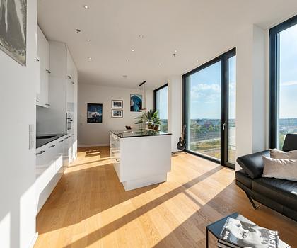 Exklusives Stadtdomizil mit Panoramablick bis zu den Alpen und Rooftop-Nutzung im Friends Tower 2