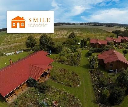 Naturverbundenes Wohnen in stilvollen Blockbohlenhäusern