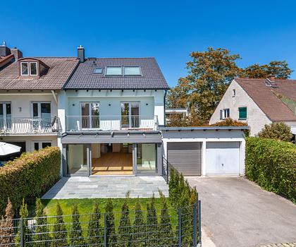 Familiengerecht: Soeben saniertes Reiheneckhaus mit Wintergarten, Terrassen und Südgarten