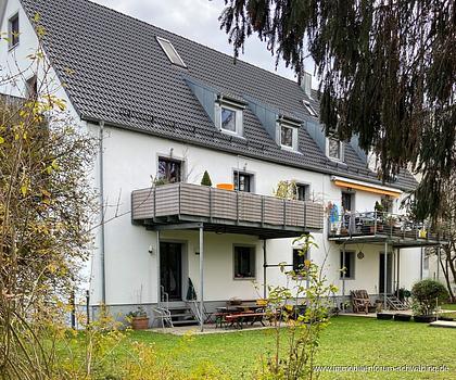 Familiengerechte 3-Zimmer-Wohnung mit Terrasse und großem Gartenanteil in Unterföhring!