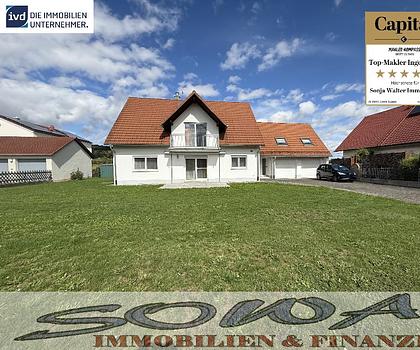 Einzugsbereites Zweifamilienhaus mit Keller, Doppelgarage und Wärmepumpe - Ein Objekt von SOWA Immobilien und Finanzen