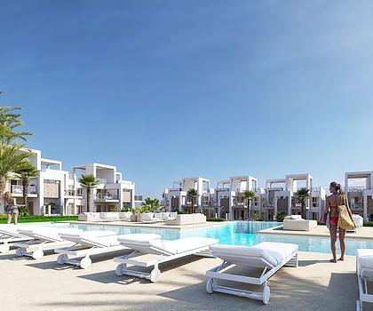 Erdgeschoss-Wohnungen mit 2 Schlafzimmern, 2 Bädern, Klimaanlage, Einbauküchen mit Elektrogeräten, Kfz-Stellplatz und Gemeinschaftspool