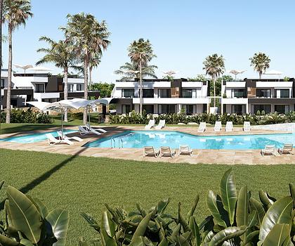 Obergeschoss-Wohnungen mit 2 Schlafzimmern, 2 Bädern, Dachterrasse, Einbauküchen mit Elektrogeräten, Klimaanlage, Kfz-Stellplatz und Gemeinschaftspool