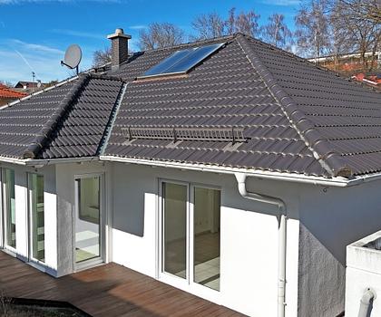 Gepflegter Bungalow mit ausgebautem DG und 2 x Einzelgaragen in zentraler Lage von Kolbermoor