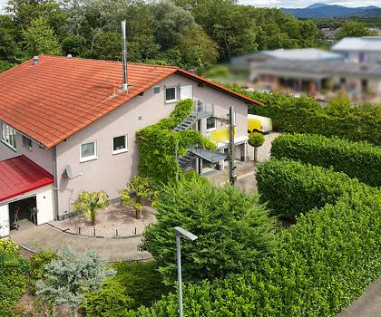 Vielseitiges Wohn- und Geschäftshaus in Buggingen – stilvoll wohnen und arbeiten unter einem Dach