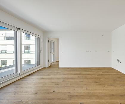 Neubau: Idealer Grundriss und Westausrichtung: Exklusive 3-Zimmer-Neubauwohnung mit Dachterrasse