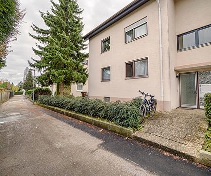 Charmante Erdgeschosswohnung mit Terrasse, Garten und Garage