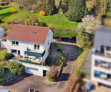Großzügiges Familienhaus in sonniger Lage mit Sauna, Garten und viel Wohnkomfort