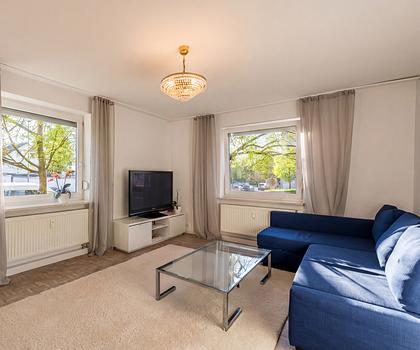 Gut geschnittene 3-Zimmer-Wohnung mit Balkon und Garten in ruhiger Lage