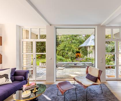 Design-Ästhetik und Natur: Edles Architektenhaus mit zauberhaftem Garten direkt am Herzogpark