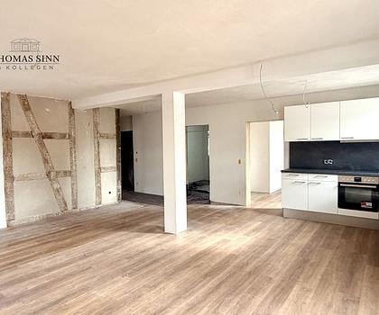 Besonderes Wohngefühl garantiert – 3,5-Zimmer Wohnung im 1. OG mit Balkon & historischem Charme
