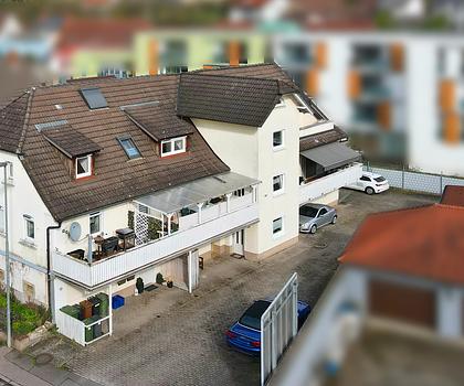Attraktives 4-Familienhaus mit leerstehender, 129 m² großer Dachgeschosswohnung