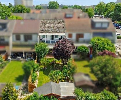 ++Familienglück mit großem Garten – Charmantes Reihenmittelhaus mit Terrasse in Raunheim++