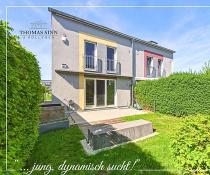Familienfreundliche "Doppelhaushälfte" mit pflegeleichtem Garten und viel Platz auf drei Etagen